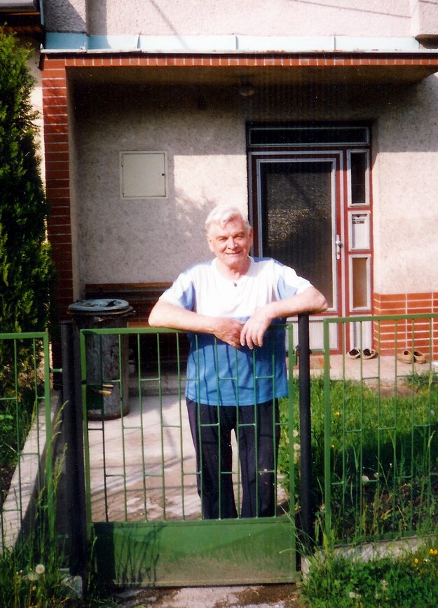 Granpa in front of his house