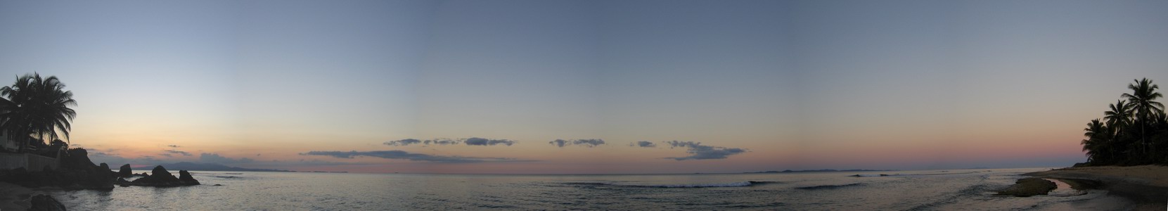 Atlantic twilight. At the horizon from left: Puerto Rico, Culebra, and St. Thomas far right at a distance.