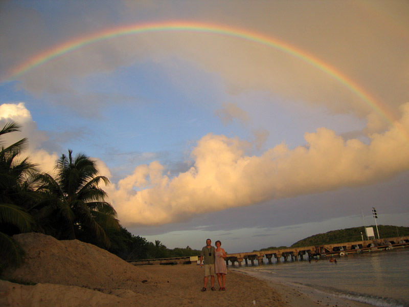 Sunset with a rainbow over the Caribbean