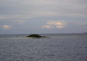 Tomáš took this picture of an election banner placed on the tiny little island lost in the ocean (July 2006) Tomáš took this picture of an election banner placed on the tiny little island lost in the ocean (July 2006)