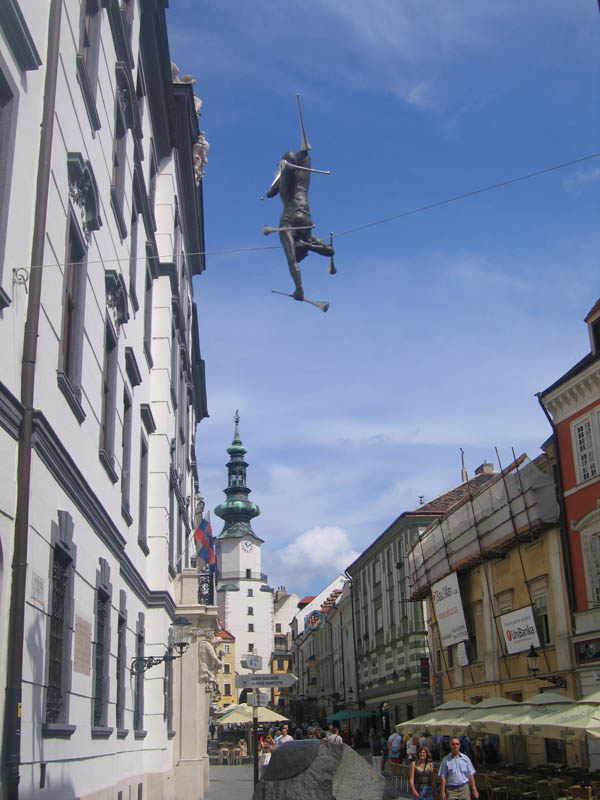 Unusual statues above the street