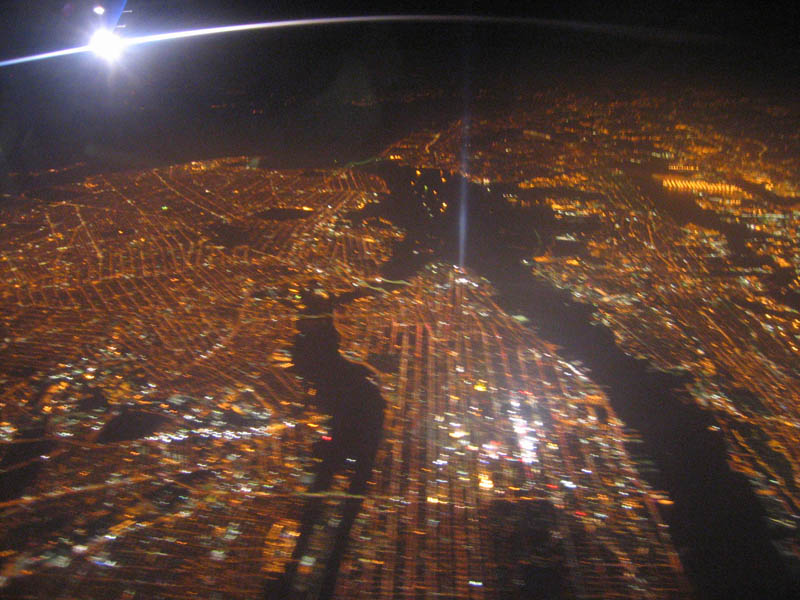 ...midnight arrival to New York. Nicely visible bridges as well as ships anchored in the bay.