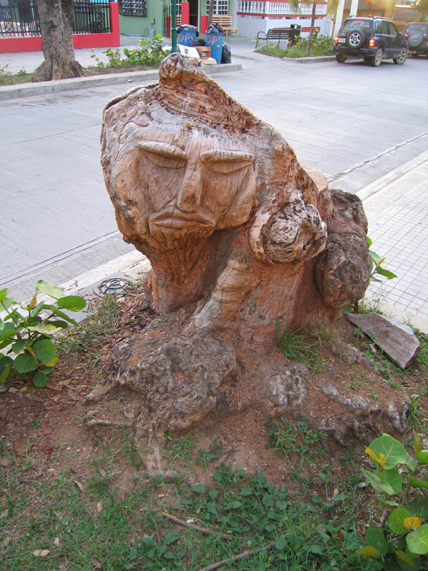 Wooden statue in front of the funeral house in Isabel Segunda