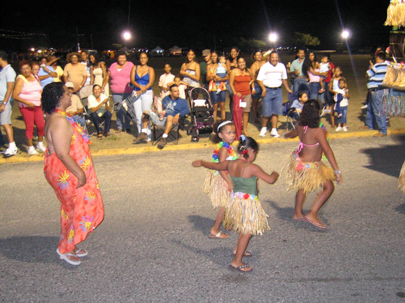 The next day, a carnival arrived. They showed the history of the island...