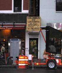 A store wide enough only for the door in between two buildings (January 2007)