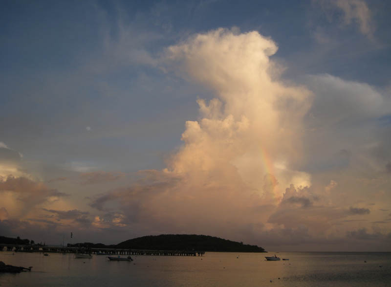 Sunset, rainbow, and moon on the same sky - you don't see that every day