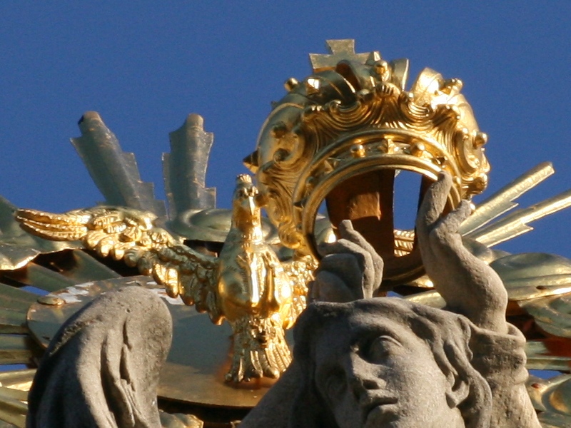 Golden crown on top of the plague pillar in Kremnica (December 2008)