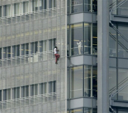 Renaldo Clarke climbs the New York Times Building