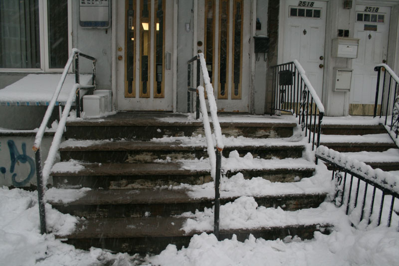 How our landlord cleaned his stairs - he's pushed the snow to our side that used to be clean before