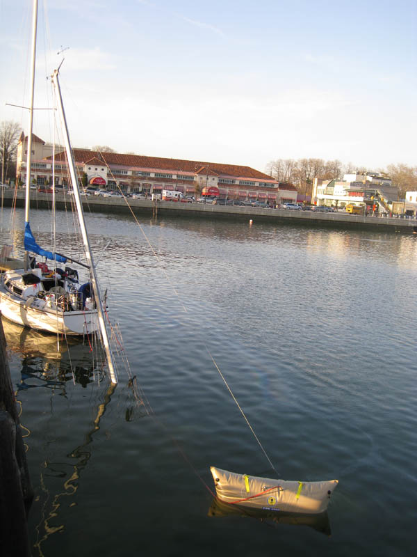 And another sunken boat. They are trying to pull this one up using the air-bags