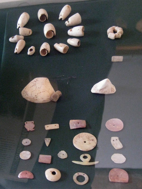 Jewelry in bone, conch shell, stone, and other materials