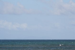 Almost invisible silhouette of St. Thomas at the distant horizon (August 2010) Almost invisible silhouette of St. Thomas at the distant horizon (August 2010)