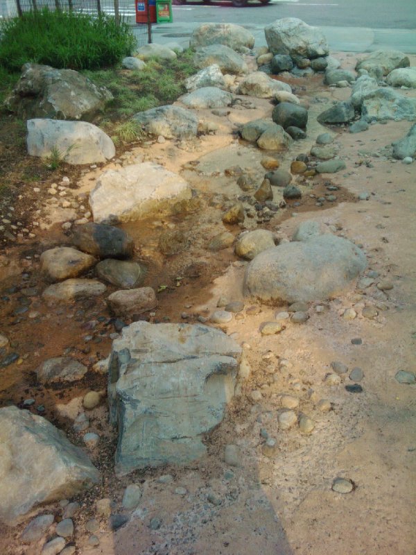 There is a new artificial brook in the park near my workplace (and maybe just a broken water pipe)