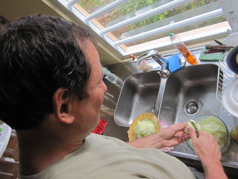 Slicing cucumbers for salad by a potato-peeler - I have time, I am on vacation...