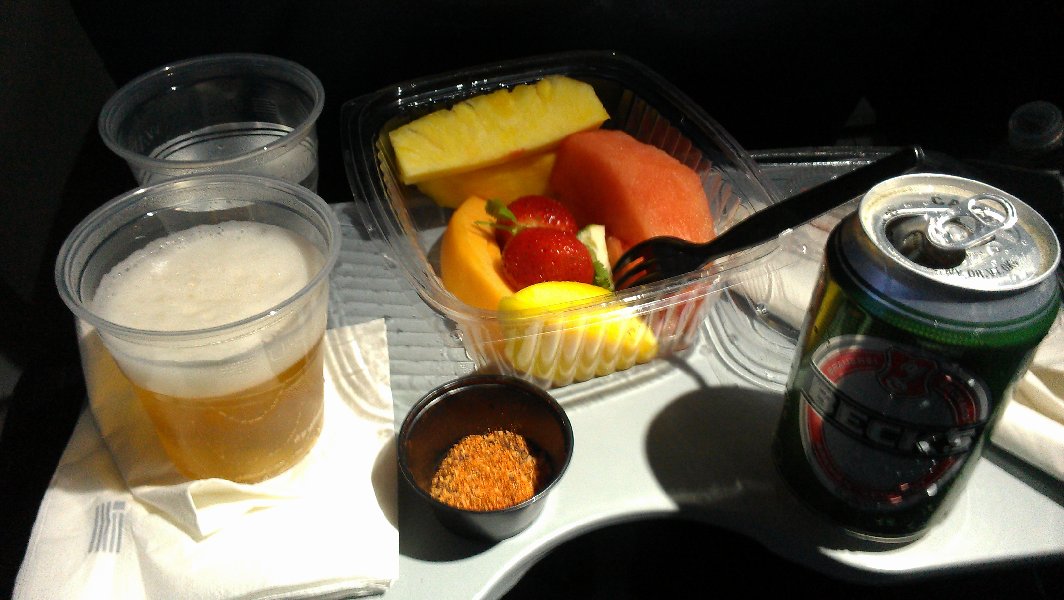 The dinner, we bought the spicy fruit salad yet at the airport and the beer already in airplane