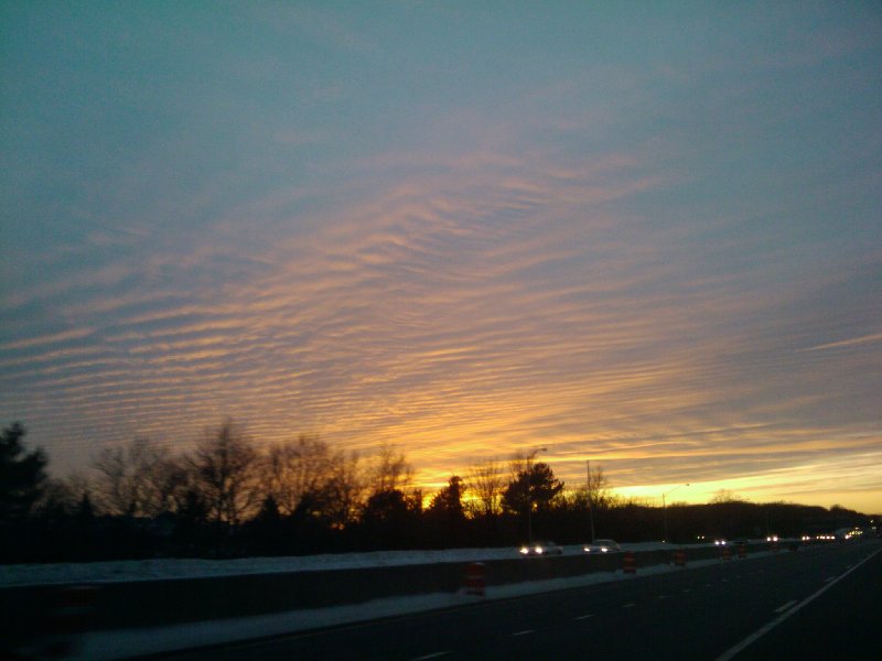 Sunset at Long Island Expressway - clouds looked like seawaves