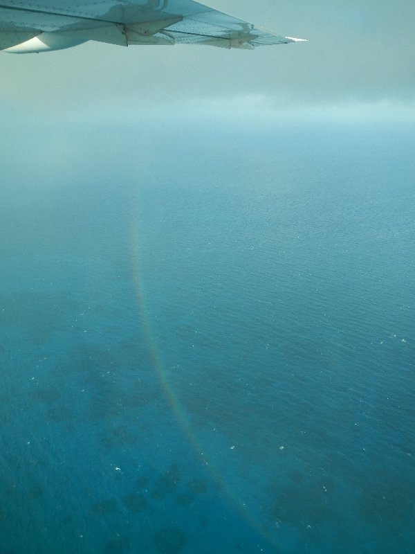 Seen from an airplane, the rainbow creates a full circle