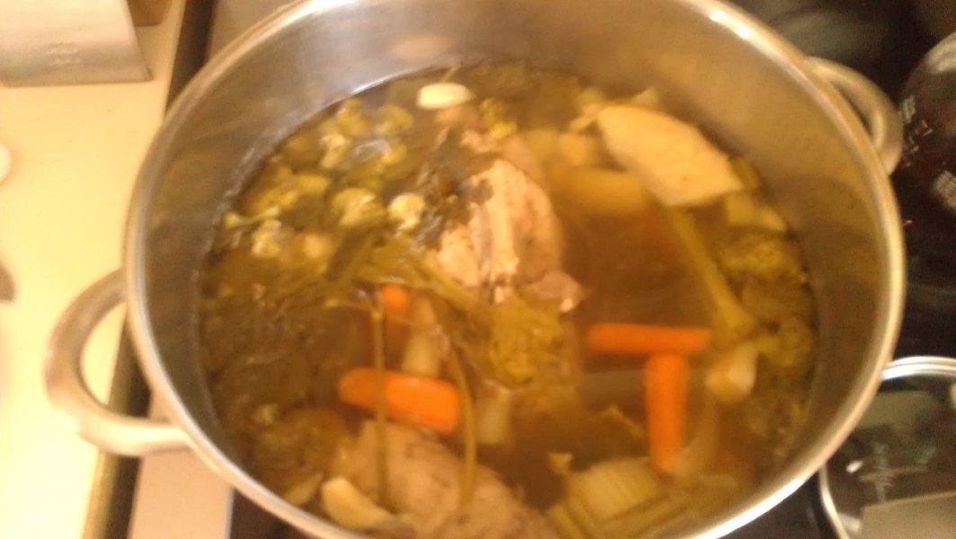 Tom is cooking the chicken soup