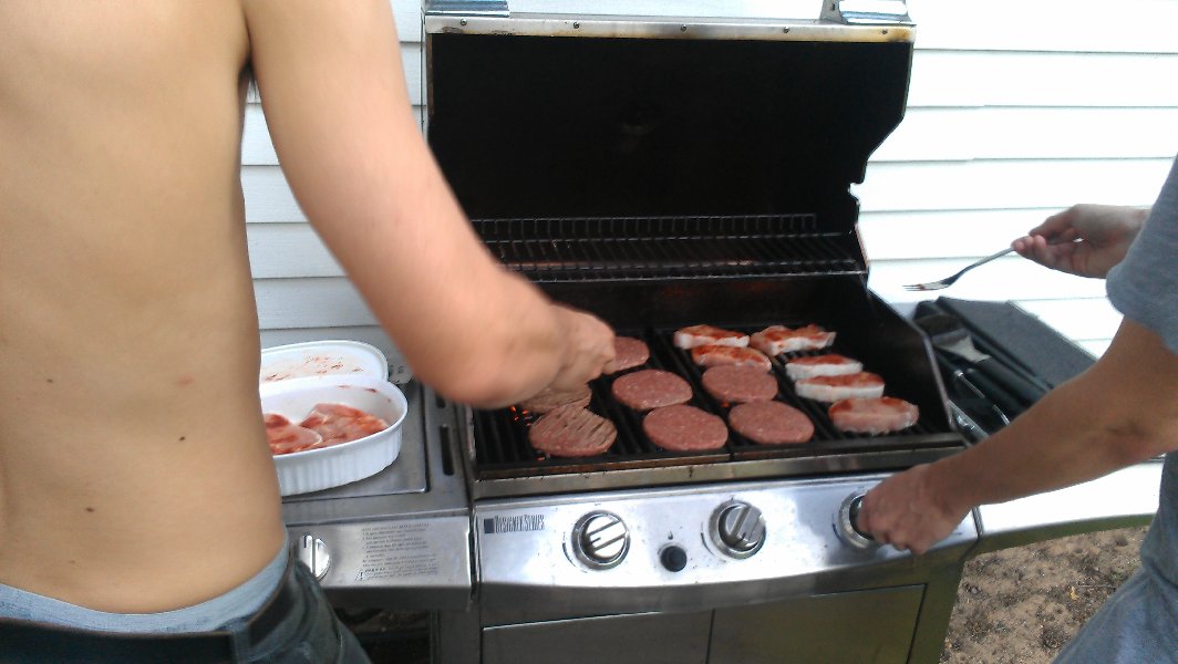 Michal is preparing hamburgers