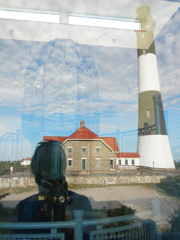 Autoportrait with a lighthouse and the original Fresnel lens