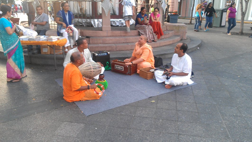 Krishna followers were singing continuously maha mantra as they were offering cookies to passers by