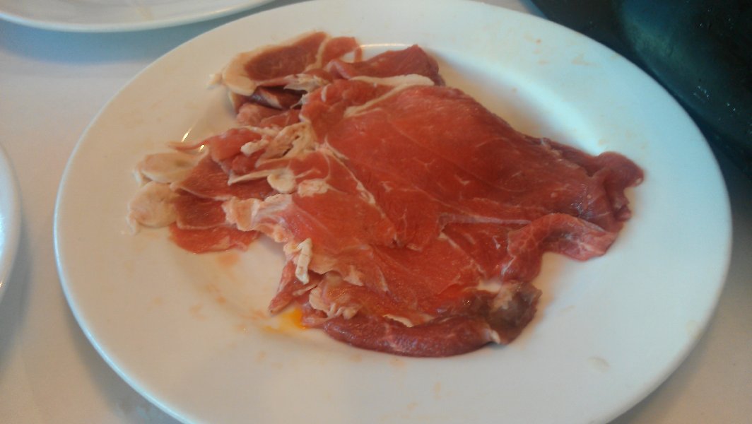 Raw lamb slices