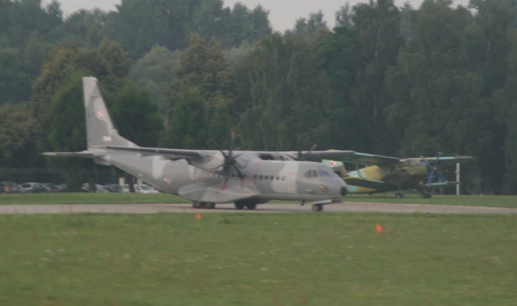 Polish Air Force airplanes at the Krakow Airport - C-295 and an old biplane An-2