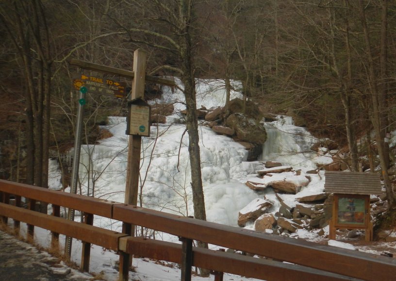 Frozen waterfall next to the road