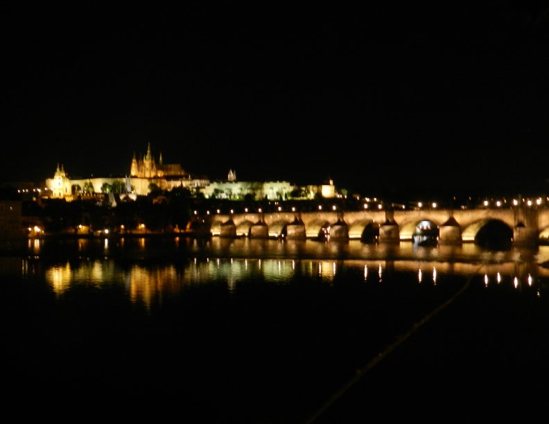 Prague Castle and Charles Bridge seen from the other bank of Vltava