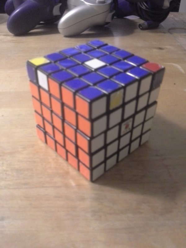 Jojo almost finished the 5-layer cube