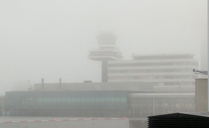 The main control tower is not visible in the fog - it's only about 200 ft behind this small one (which itself is some 70 ft from me)