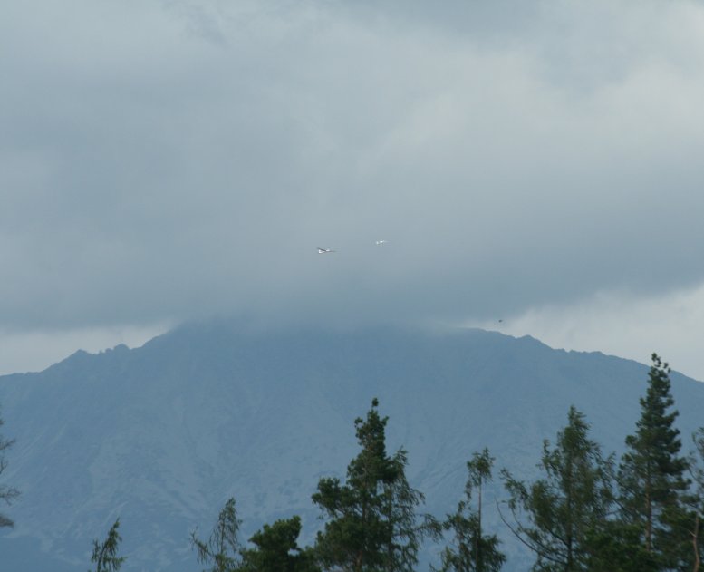 Adrenalin sport - glider in the storm