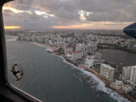 Sun rising behind El Yunque mountain as we are departing (January 2019) Sun rising behind El Yunque mountain as we are departing (January 2019)