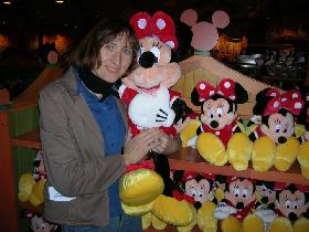 Milena holding a sister of Mickey mouse. (December 2005)