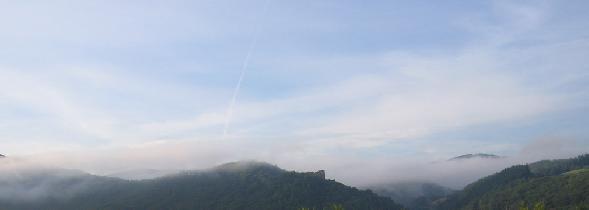 ov Castle and tiavnica Hills in a morning haze (August 2006)