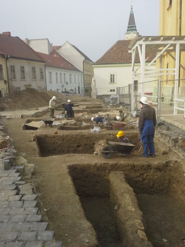 Archaeologists digging in front of the church (November 2014)