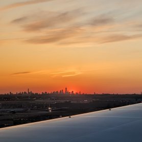 Landing in New York - beautiful sunset. Downtown Manhattan at the distance. (April 2024)