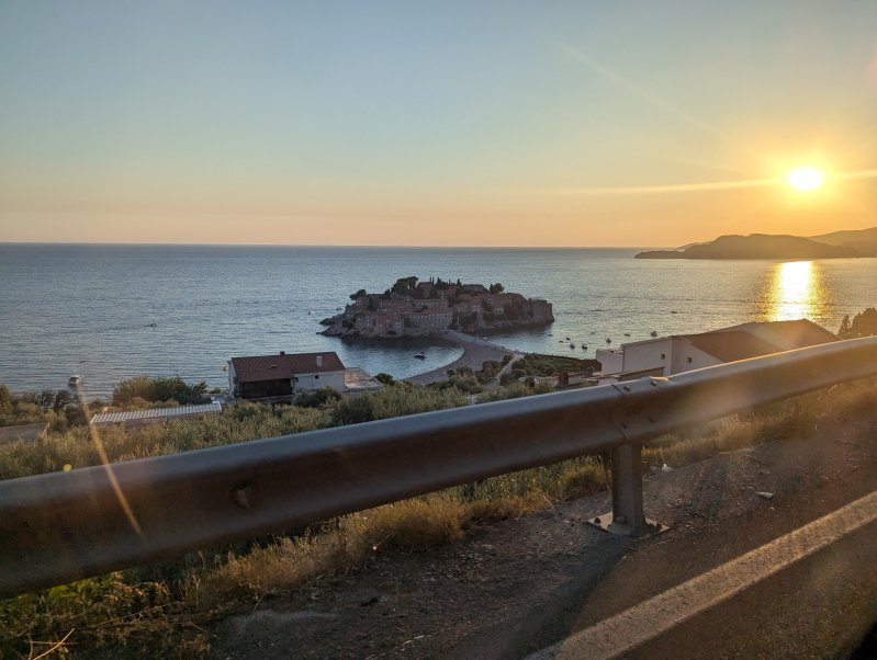 A view towards the town of Sveti Stefan - while driving on Adriatic coastal road (August 2024)