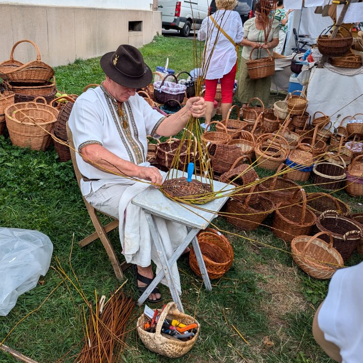 A basket maker shows the old craft (September 2024)