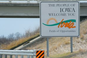 This welcoming board is technically in Minnesota too (few dozens foot before the actual border) (April 2015)
